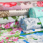 Velge det beste stoffet for sengetøy: Sammenligning av poplin, calico, percale og sateng