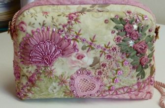 Clutch laget av stoff med broderi
