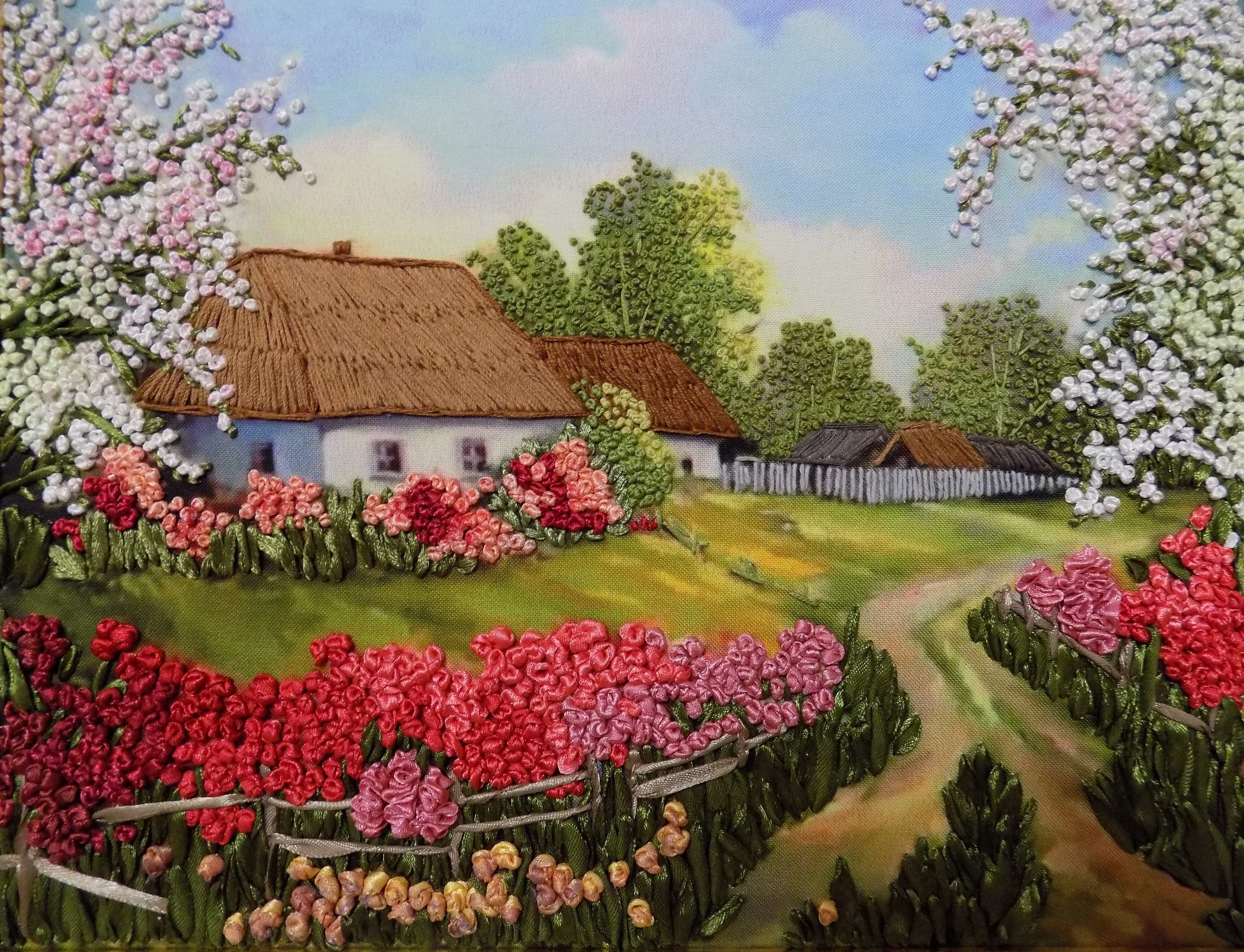 Hus på broderi