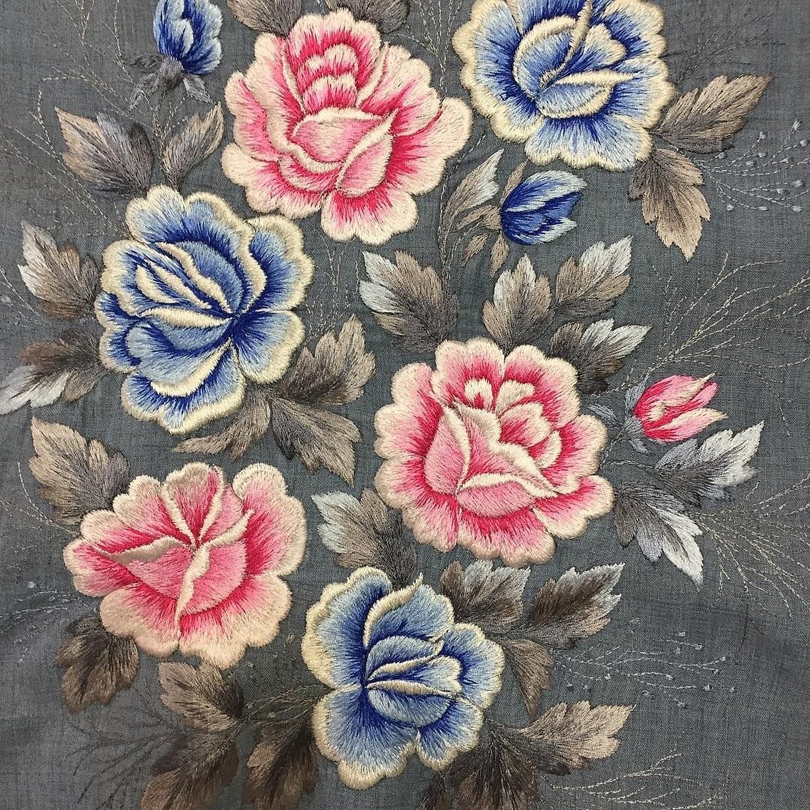 Blomsterdesign på bomullsstoff