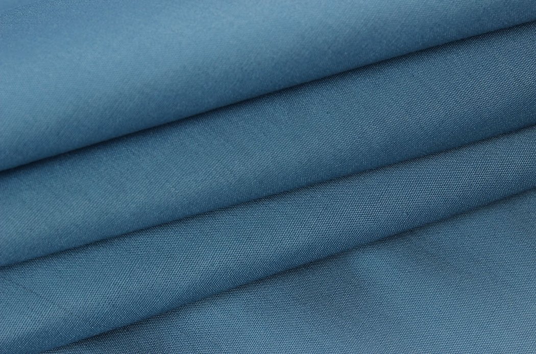 TC er en forkortet betegnelse for en blanding av bomull og polyester.